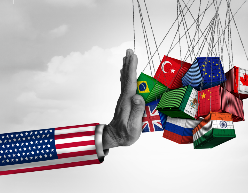 hand pushing shipping containers with flags on it